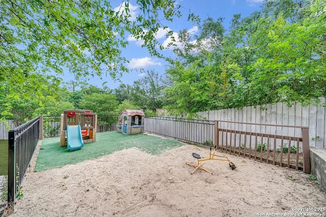 13619 Mesa Pt, San Antonio, TX 78232 - fenced backyard with a playground
