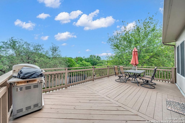 13619 Mesa Pt, San Antonio, TX 78232 - wooden terrace with outdoor dining area and area for grilling