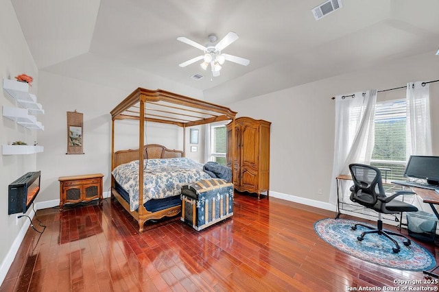 13619 Mesa Pt, San Antonio, TX 78232 - bedroom with vaulted ceiling, hardwood / wood-style flooring, baseboards, heating unit, and ceiling fan