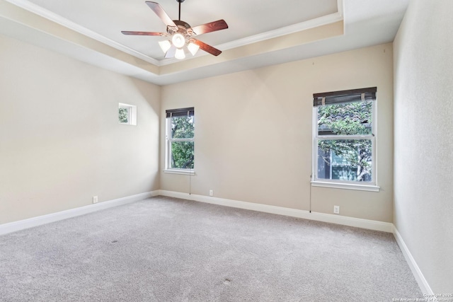 6327 Almeria Cir, San Antonio, TX 78257 - spare room featuring crown molding, carpet, a tray ceiling, ceiling fan, and baseboards