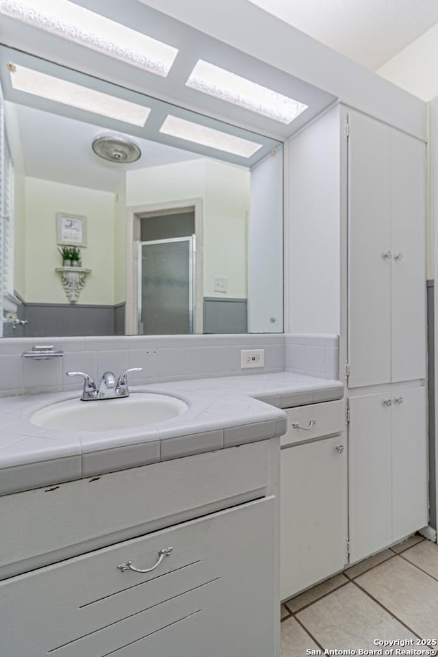 5718 Ponderosa Dr, San Antonio, TX 78240 - bathroom featuring vanity and tile patterned flooring