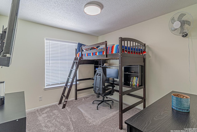 5718 Ponderosa Dr, San Antonio, TX 78240 - bedroom with a textured ceiling, baseboards, carpet, and a desk