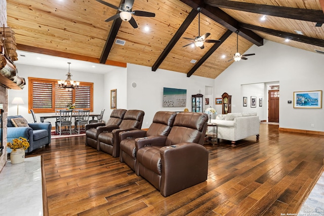 1133 Horseshoe Fls, Bandera, TX 78003 - living room with a ceiling fan, hardwood / wood-style flooring, beam ceiling, high vaulted ceiling, and a chandelier