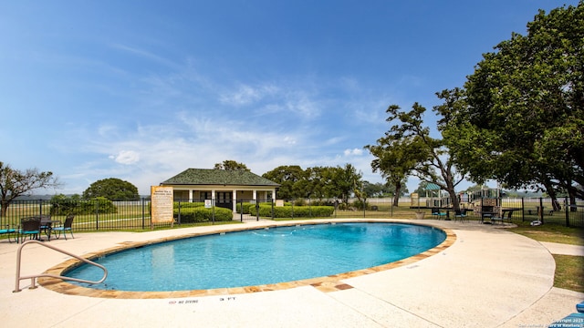 1133 Horseshoe Fls, Bandera, TX 78003 - community pool featuring fence and a patio