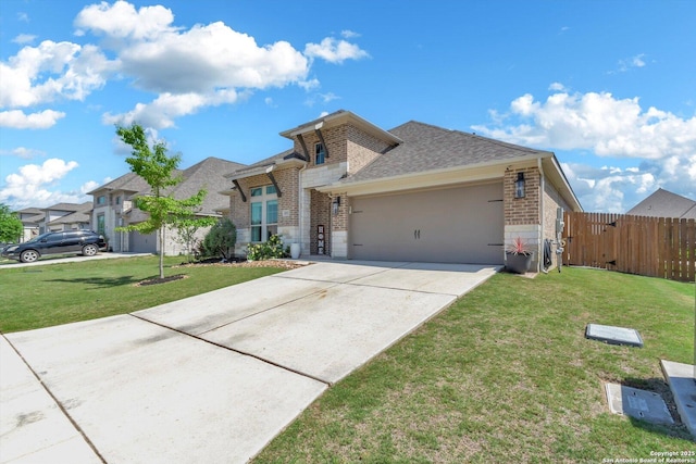 2977 Grove, Seguin, TX 78155 - view of front of property with brick siding, an attached garage, driveway, and a shingled roof