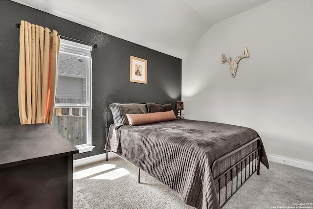 2977 Grove, Seguin, TX 78155 - carpeted bedroom featuring baseboards, lofted ceiling, and a textured wall