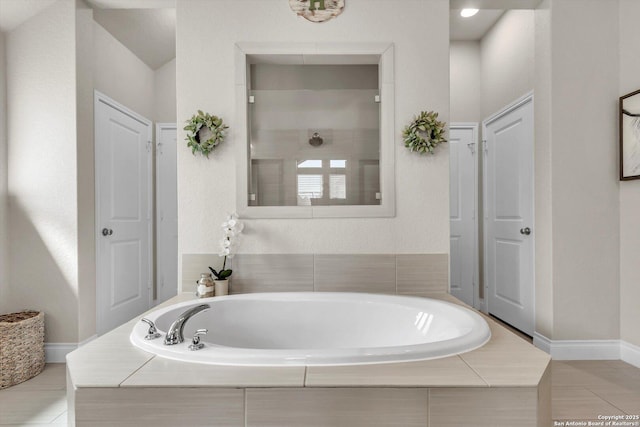 2977 Grove, Seguin, TX 78155 - full bathroom with a bath, walk in shower, and baseboards