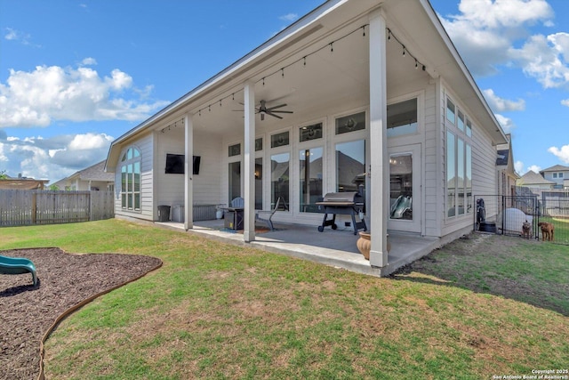 2977 Grove, Seguin, TX 78155 - back of property featuring a patio area, a ceiling fan, and a gate