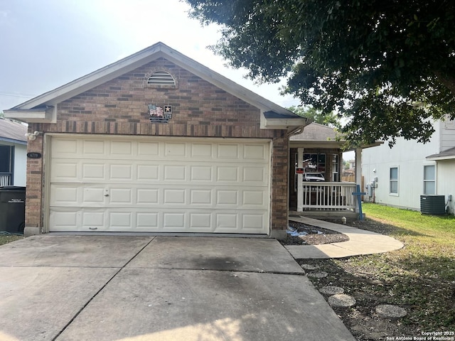 6719 Dragon Fire, San Antonio, TX 78242 - ranch-style house featuring driveway, central air condition unit, brick siding, a garage, and a porch