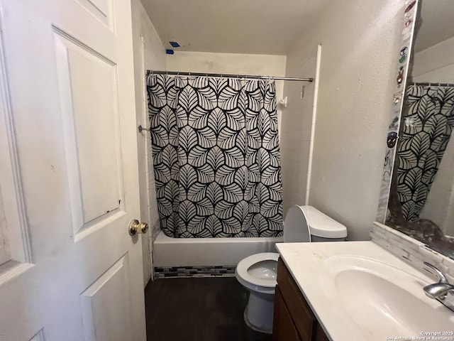 6719 Dragon Fire, San Antonio, TX 78242 - bathroom featuring toilet, vanity, and shower / tub combo