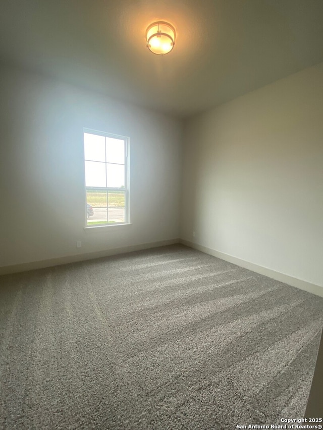1641 Saddleback Run, New Braunfels, TX 78130 - carpeted empty room featuring baseboards