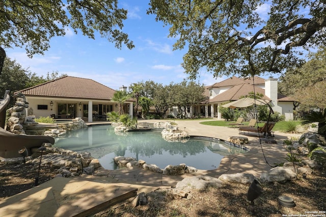 19902 Messina, San Antonio, TX 78258 - view of swimming pool featuring a patio area and a pool with connected hot tub
