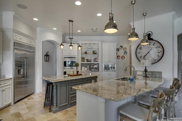 19902 Messina, San Antonio, TX 78258 - kitchen with built in appliances, a sink, a kitchen bar, open shelves, and light stone counters