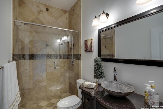 19902 Messina, San Antonio, TX 78258 - full bathroom with a shower stall, vanity, and toilet