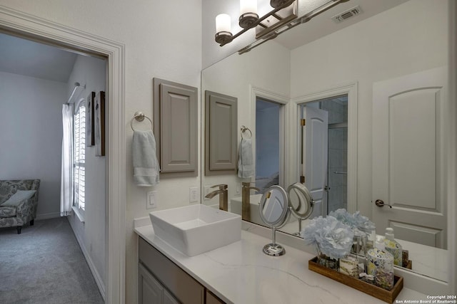 19902 Messina, San Antonio, TX 78258 - bathroom featuring vanity, a shower with door, and baseboards