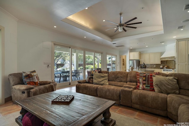 19902 Messina, San Antonio, TX 78258 - living area featuring a raised ceiling, ceiling fan, recessed lighting, and crown molding