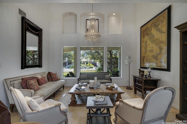 19902 Messina, San Antonio, TX 78258 - living area with a chandelier, a towering ceiling, and baseboards