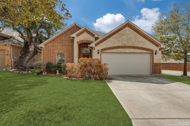 5502 Waldon Walk, San Antonio, TX 78261 - french provincial home featuring stone siding, a garage, driveway, and brick siding