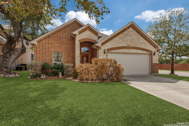 5502 Waldon Walk, San Antonio, TX 78261 - french country inspired facade with stone siding, a garage, driveway, cooling unit, and brick siding