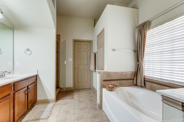 5502 Waldon Walk, San Antonio, TX 78261 - full bath with tile patterned flooring, a bath, a shower stall, and vanity