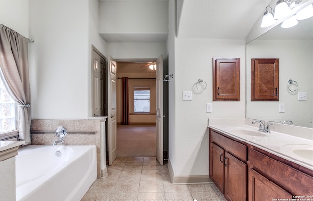 5502 Waldon Walk, San Antonio, TX 78261 - bathroom featuring a garden tub, double vanity, and tile patterned flooring