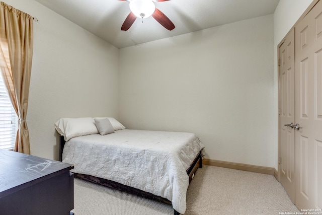 5502 Waldon Walk, San Antonio, TX 78261 - bedroom featuring carpet flooring, baseboards, ceiling fan, and a closet