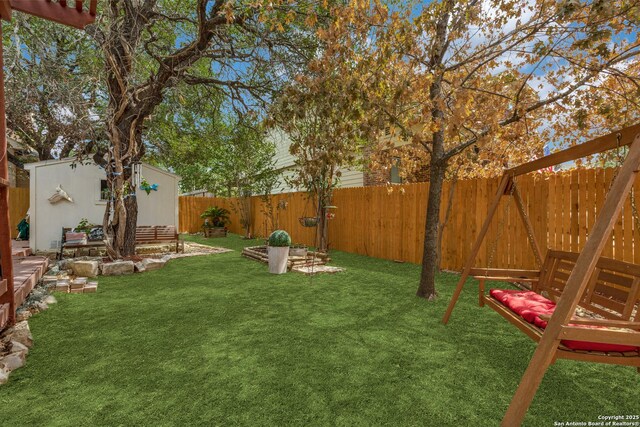 5502 Waldon Walk, San Antonio, TX 78261 - view of yard with an outbuilding