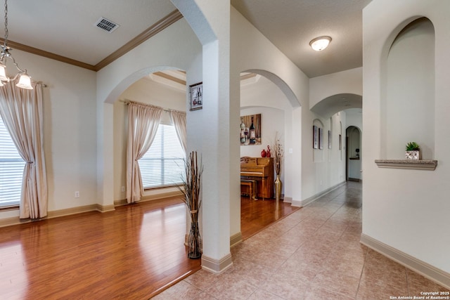 5502 Waldon Walk, San Antonio, TX 78261 - hall featuring crown molding, light wood-style floors, and baseboards