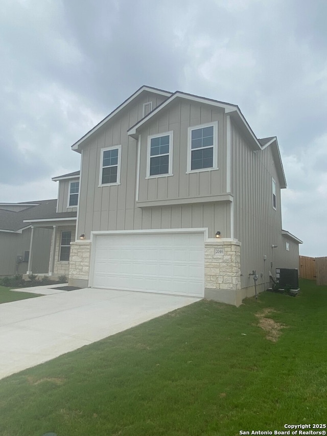 2046 Newforest Peak, New Braunfels, TX 78130 - view of front of house featuring board and batten siding, stone siding, a garage, and concrete driveway