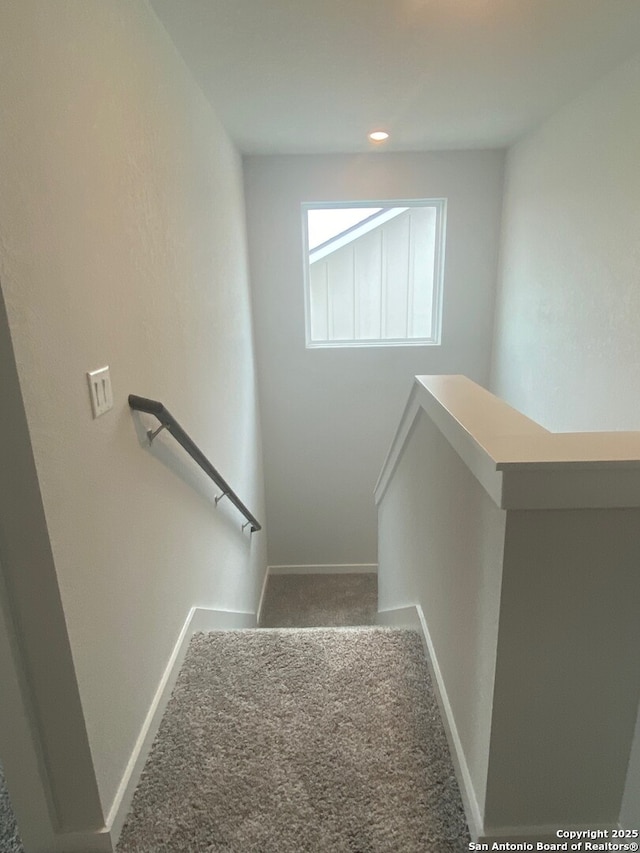2046 Newforest Peak, New Braunfels, TX 78130 - stairway with carpet and baseboards