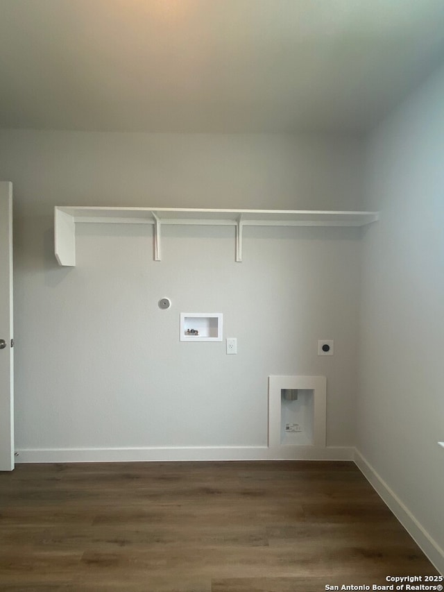 2046 Newforest Peak, New Braunfels, TX 78130 - laundry area with hookup for an electric dryer, wood finished floors, hookup for a washing machine, baseboards, and hookup for a gas dryer