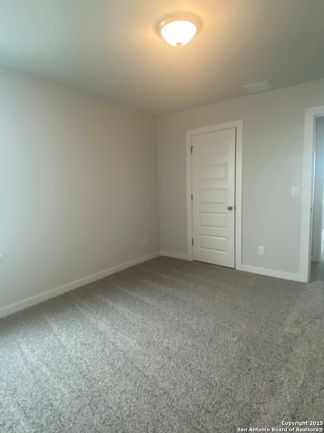 2046 Newforest Peak, New Braunfels, TX 78130 - empty room with carpet floors and baseboards