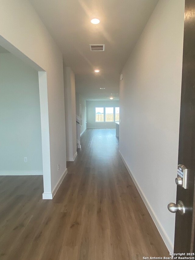 2046 Newforest Peak, New Braunfels, TX 78130 - hallway with wood finished floors, baseboards, and recessed lighting