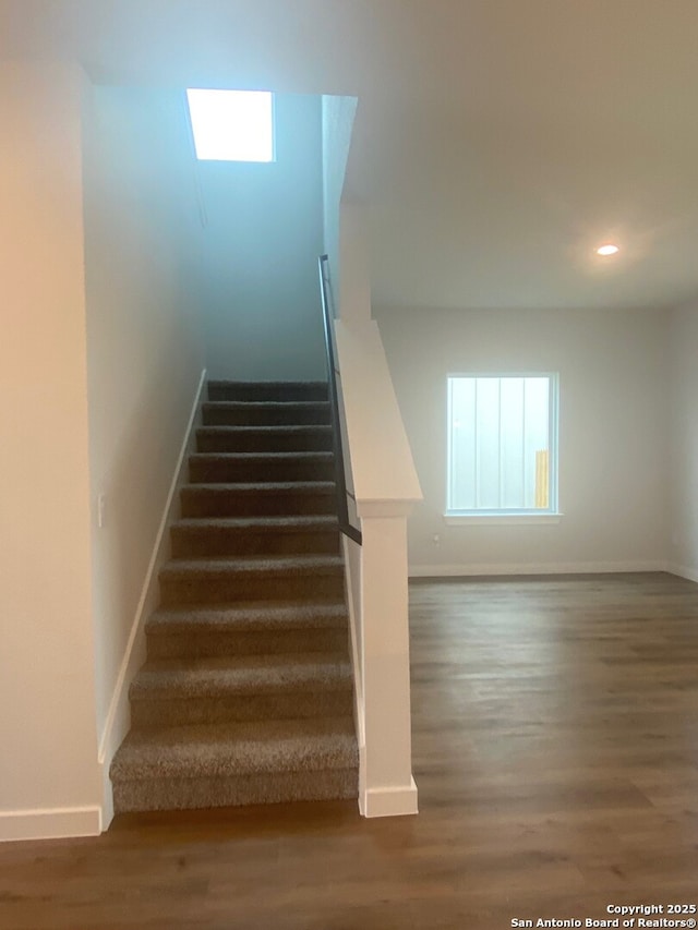 2046 Newforest Peak, New Braunfels, TX 78130 - stairs featuring baseboards, wood finished floors, and recessed lighting