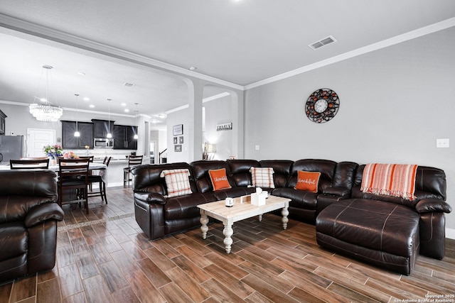 23534 Enchanted Bnd, San Antonio, TX 78260 - living room featuring crown molding, dark wood-style floors, and baseboards