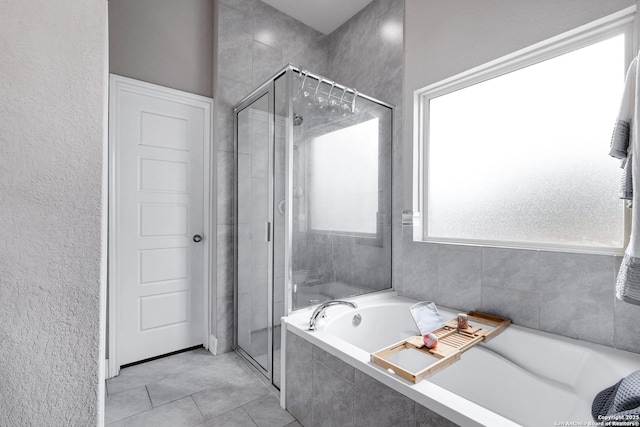 23534 Enchanted Bnd, San Antonio, TX 78260 - full bath with a shower stall, a garden tub, tile patterned floors, and a textured wall