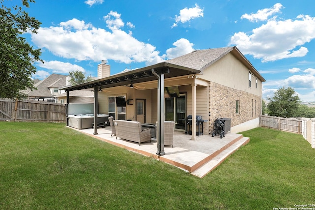 23534 Enchanted Bnd, San Antonio, TX 78260 - back of property featuring a hot tub, ceiling fan, a chimney, a patio, and brick siding
