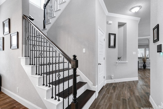 23534 Enchanted Bnd, San Antonio, TX 78260 - stairway with ornamental molding, wood finished floors, and baseboards