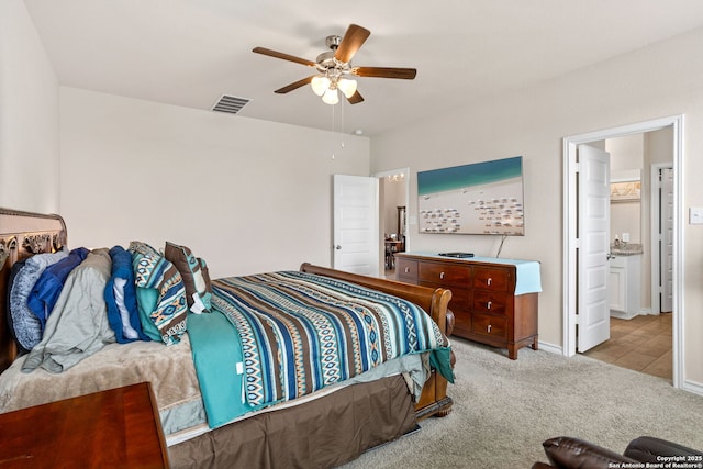 104 Mossy Bank, Cibolo, TX 78108 - bedroom featuring carpet flooring, ceiling fan, baseboards, and connected bathroom