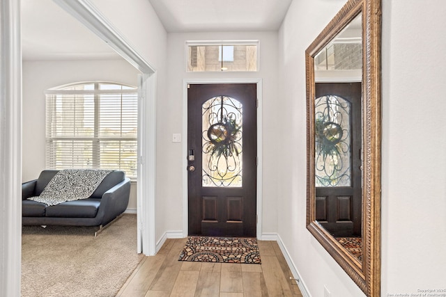 104 Mossy Bank, Cibolo, TX 78108 - foyer entrance with light wood-type flooring and baseboards