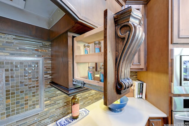 detailed view of tasteful backsplash and light countertops