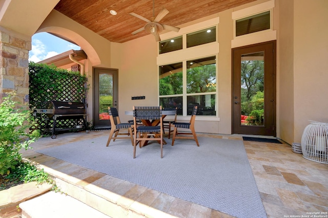 view of patio with a ceiling fan and area for grilling