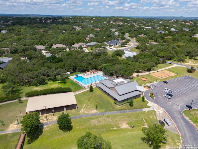 drone / aerial view of a pool