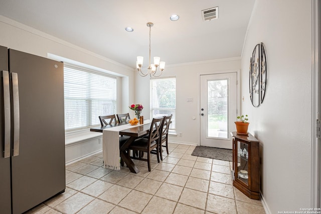 140 Eagle Vail, San Antonio, TX 78258 - dining space with ornamental molding, a chandelier, plenty of natural light, baseboards, and light tile patterned floors