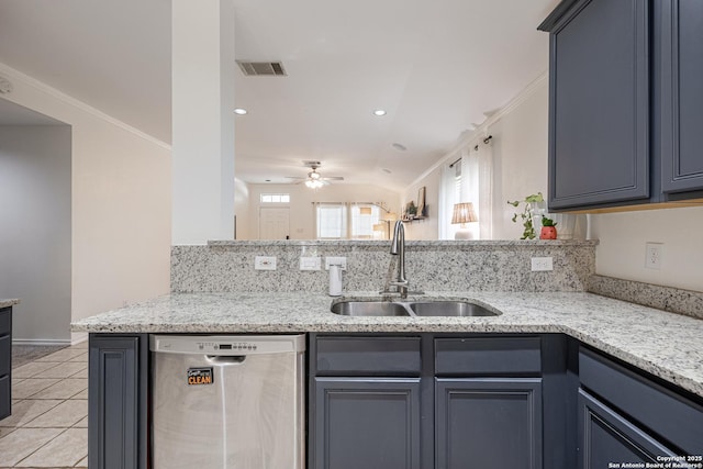 140 Eagle Vail, San Antonio, TX 78258 - kitchen featuring stainless steel dishwasher, a sink, a ceiling fan, light tile patterned flooring, and light stone countertops