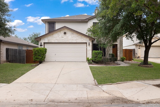 9911 Mustang Isle, San Antonio, TX 78254 - view of front of house featuring stone siding, driveway, and an attached garage