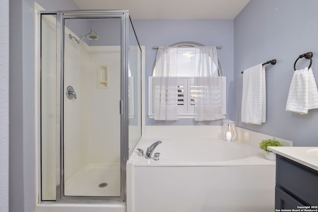 9911 Mustang Isle, San Antonio, TX 78254 - full bath featuring a shower stall, a garden tub, and vanity