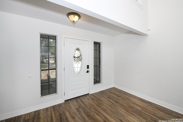8318 Tiguex, Universal City, TX 78148 - foyer featuring baseboards and dark wood finished floors
