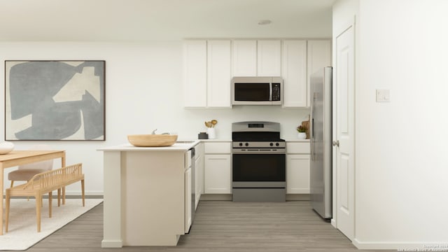 3538 Glade Crk, San Antonio, TX 78245 - kitchen with stainless steel appliances, light wood-type flooring, white cabinetry, light countertops, and baseboards