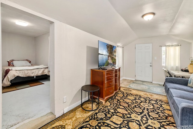 942 Mcilvaine, San Antonio, TX 78201 - bedroom featuring vaulted ceiling, baseboards, and light colored carpet